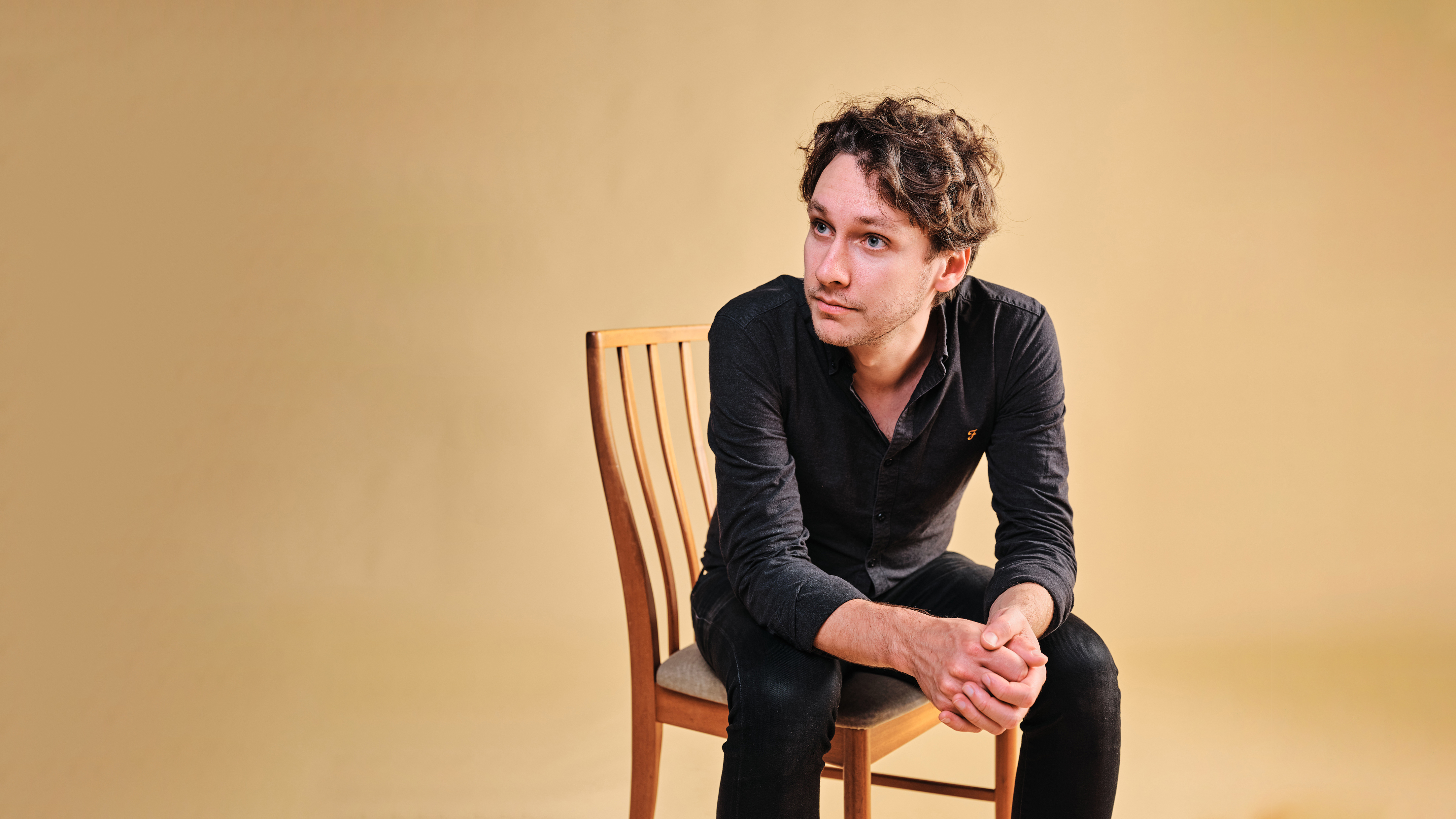 A photo of me on a chair